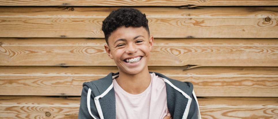 Teenage Boy Smiling With Metal Braces